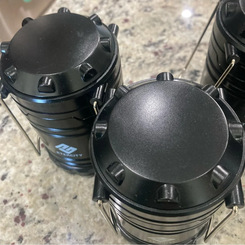 Set of 4 Etekcity black LED travel/camping lanterns Preowned **No Batteries**